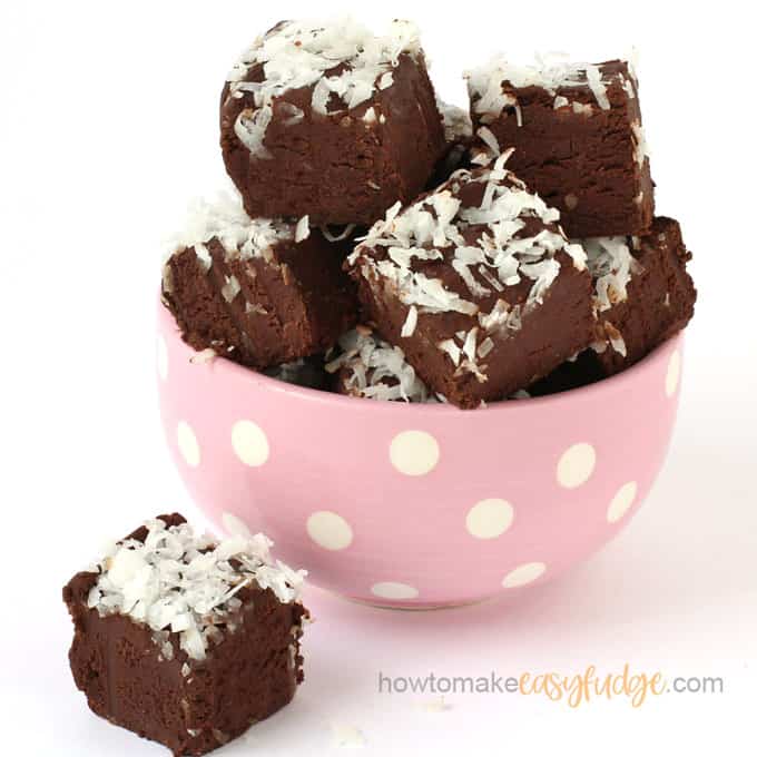 chocolate coconut fudge topped with fresh shredded coconut served in a pink polka dot bowl