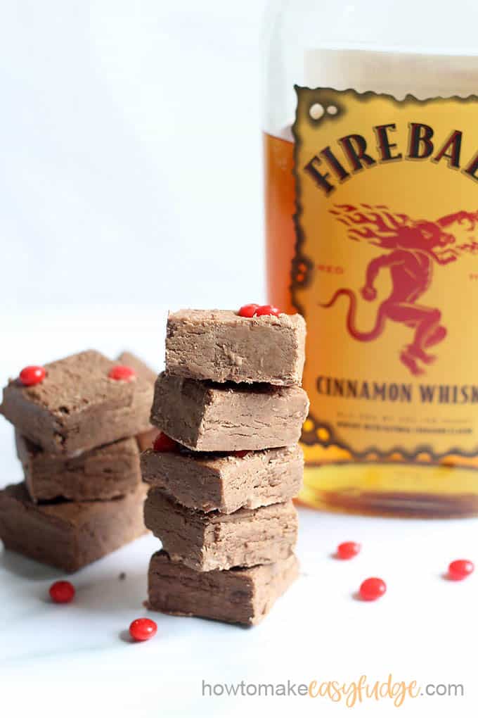 Fireball fudge with cinnamon candy stacked with bottle 