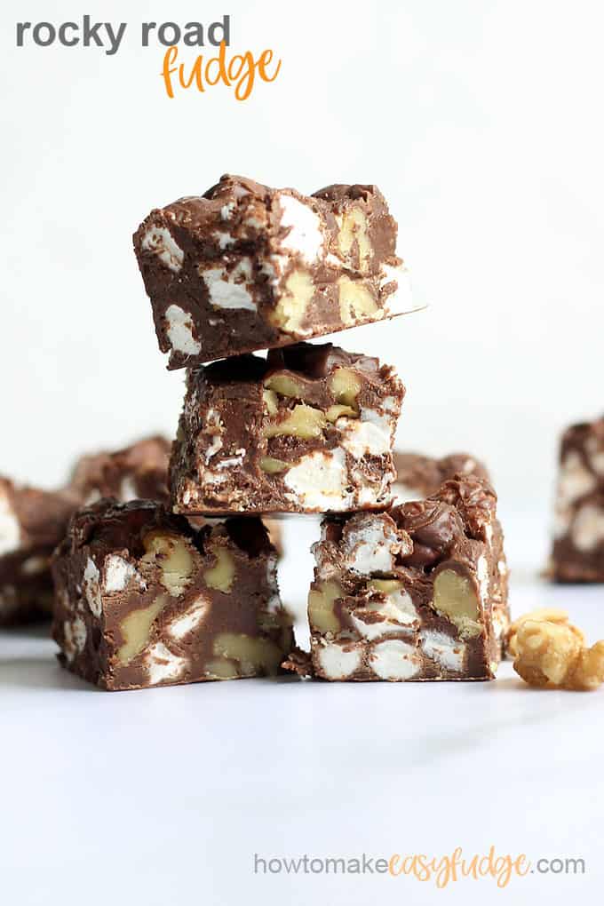 close up stack of rocky road fudge white background