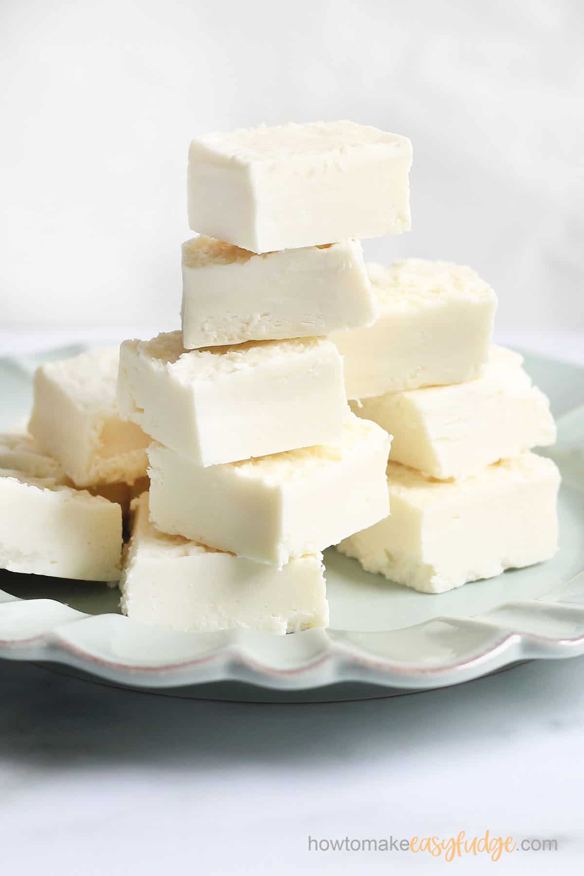 2-ingredient white chocolate fudge made with white chocolate chips and a can of store-bought frosting 