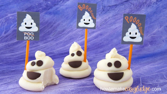 white chocolate fudge ghosts holding poop emoji ghost signs