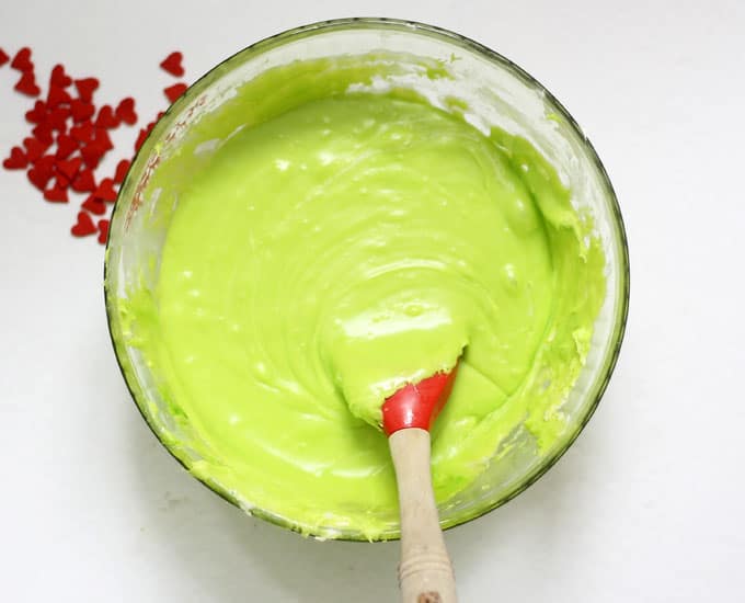 mixing Green Grinch fudge for Christmas 