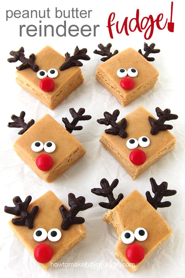 peanut butter reindeer fudge with chocolate antlers, red M&M noses, and candy eyes