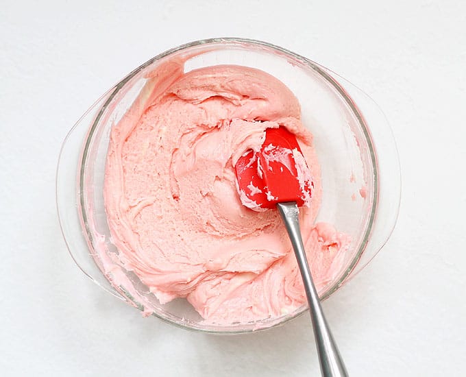 mixed strawberry frosting fudge in bowl
