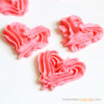 2-ingredient pink fudge hearts close up on white background