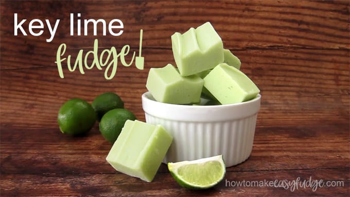 dark wood background behind a bowl of pastel green colored key lime fudge set next to a few whole key limes