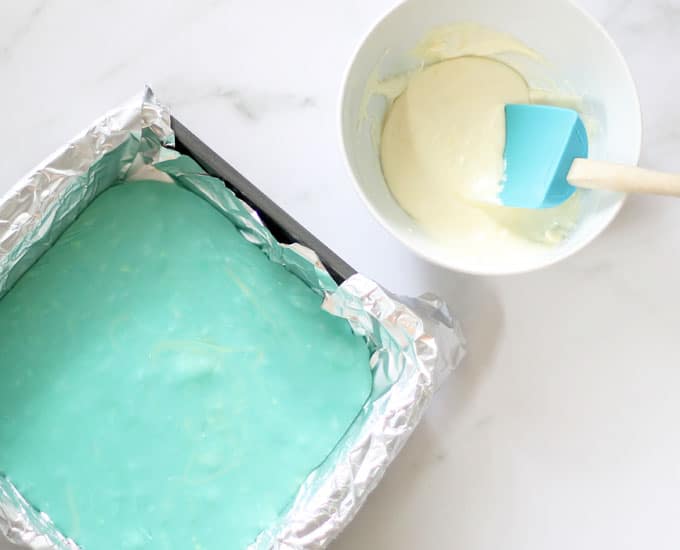 mixing food coloring into fudge for pool party summer fudge