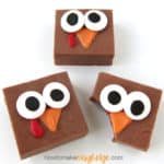 chocolate fudge turkeys have big candy eyeballs, an orange candy melts beak, and red candy melts wattle
