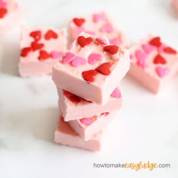 2-ingredient strawberry frosting fudge with heart sprinkles, a pretty, pink EASY Valentine's Day dessert.