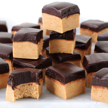 Buckeye fudge with a layer of easy peanut butter fudge topped with chocolate ganache