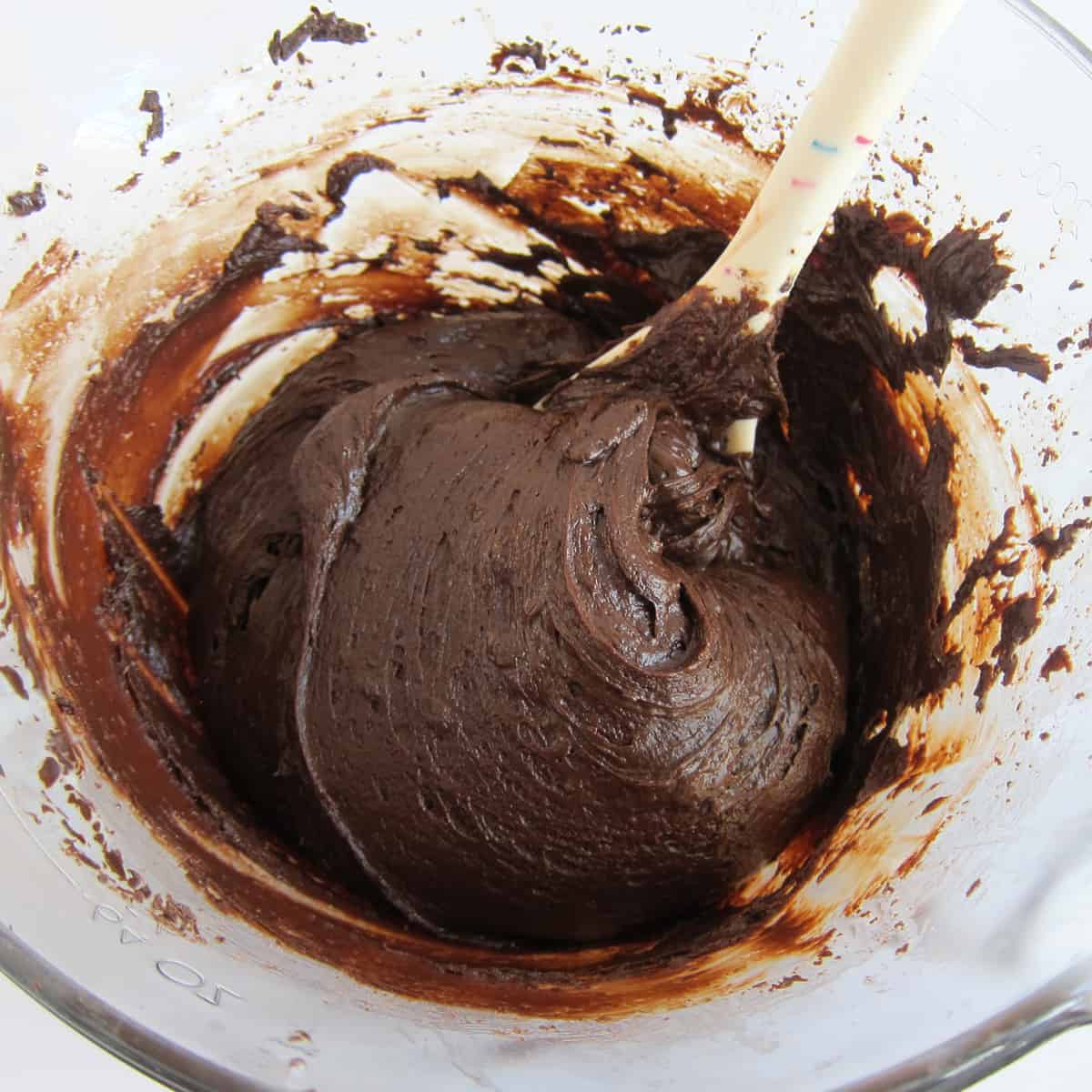 bowl filled with chocolate fudge made with sweetened condensed milk