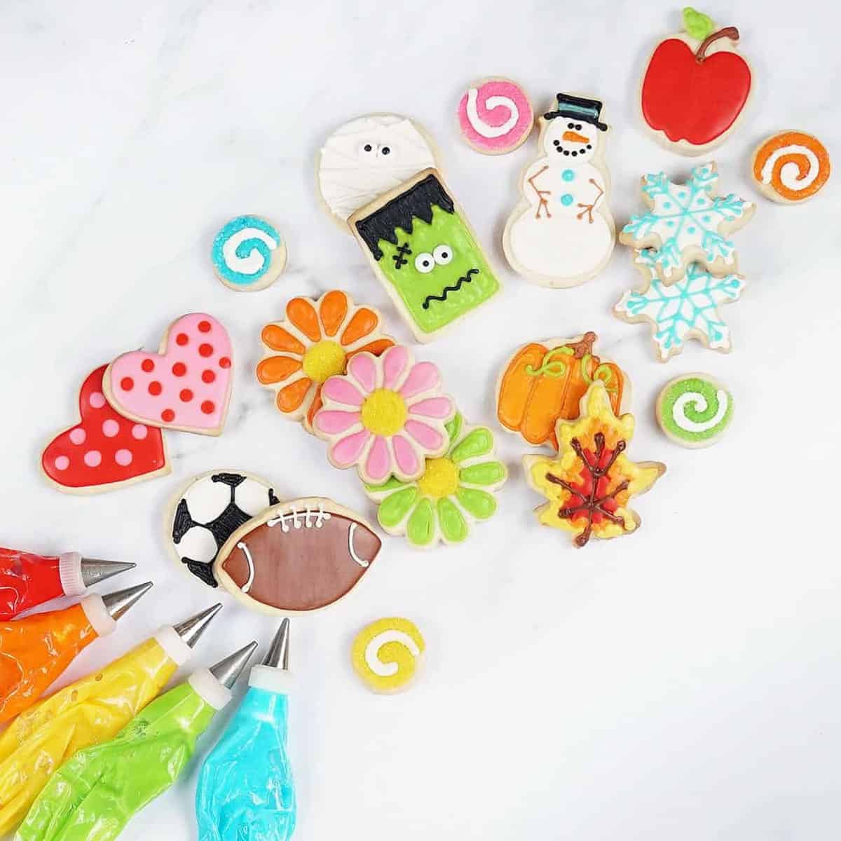 decorated cookies with bags of icing