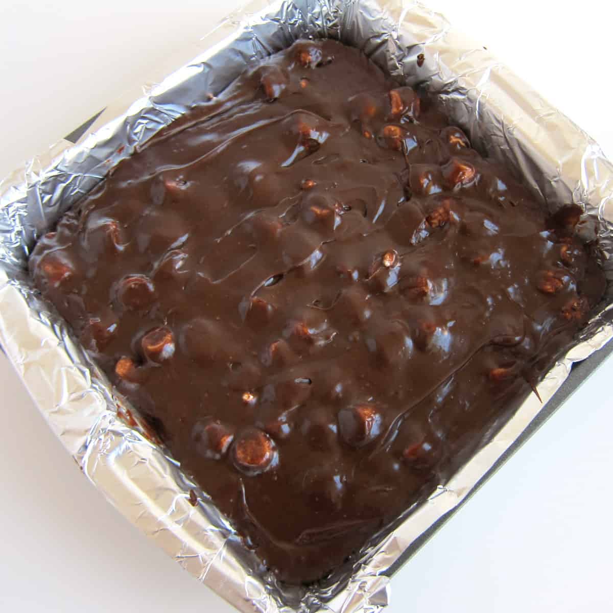 hot chocolate fudge spread into an 8-inch square pan.